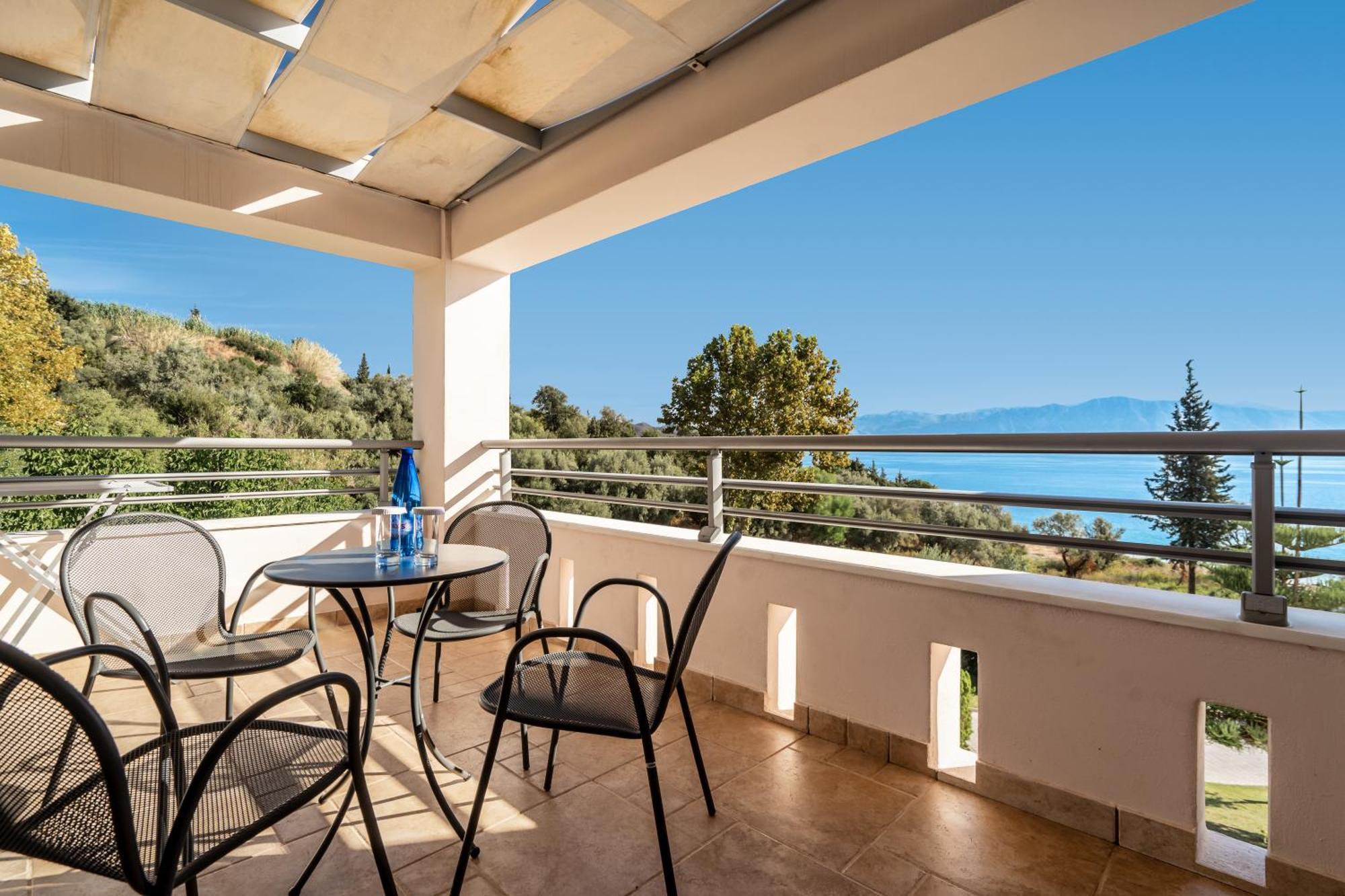 Porto Galini Seaside Resort & Spa 니키아나 외부 사진 A balcony in Greece