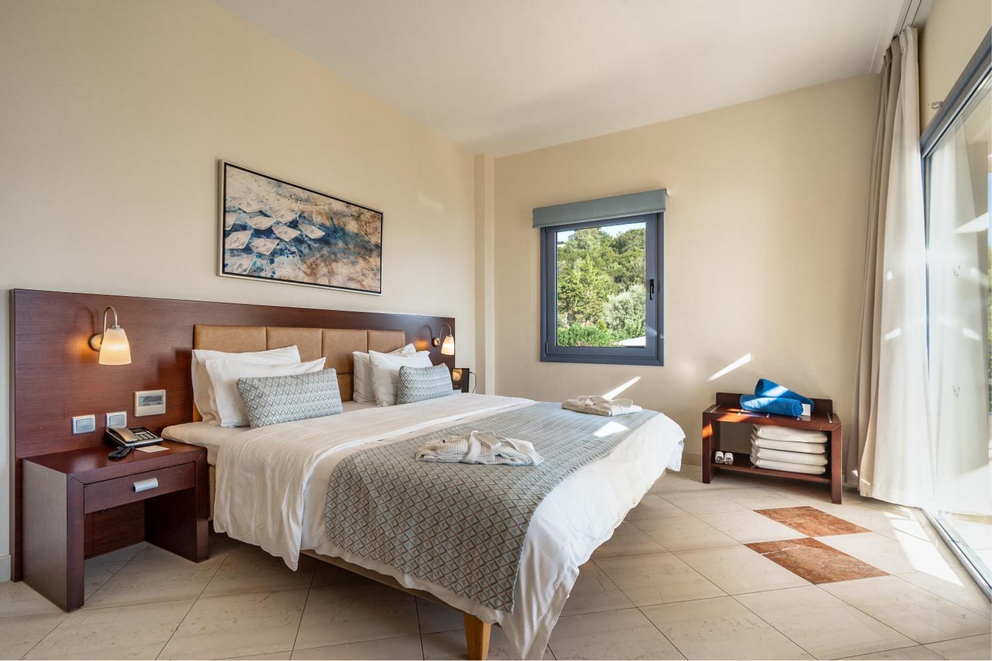 Porto Galini Seaside Resort & Spa 니키아나 외부 사진 A bedroom at the hotel